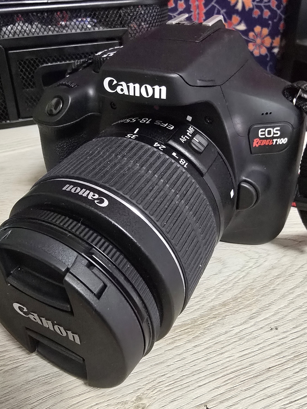 Canon EOS Rebel T100 DSLR Camera in Black with 18-55mm Lens